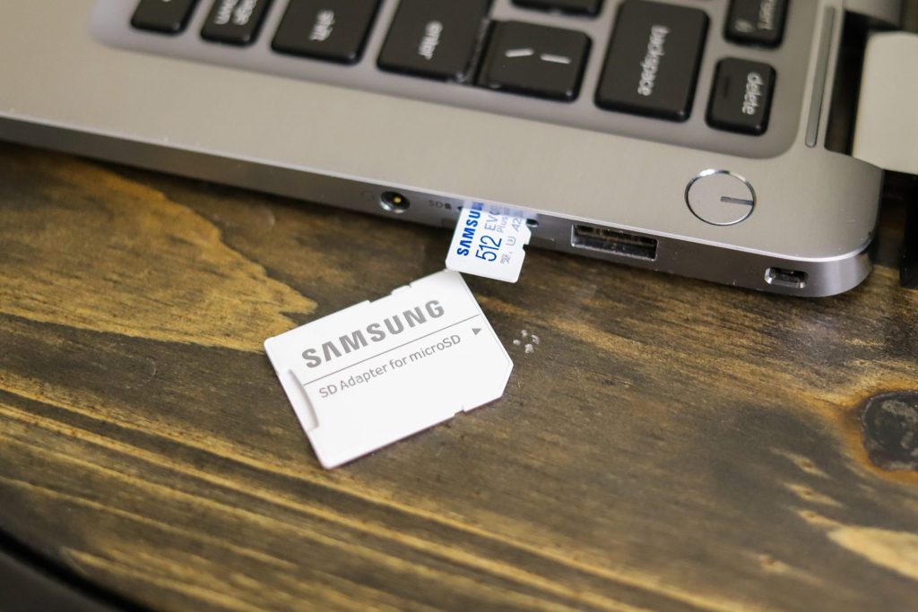 Samsung EVO Plus MicroSD front with adaptor and laptop