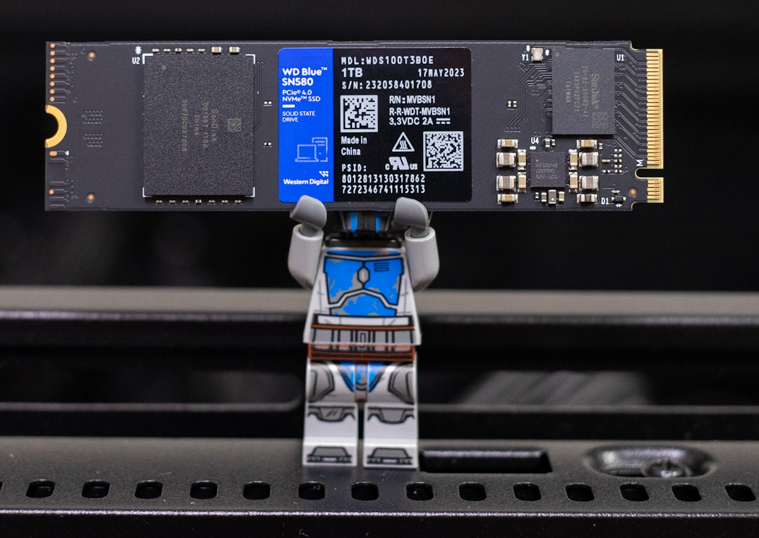 WD Blue SN580 hero with lego minifig
