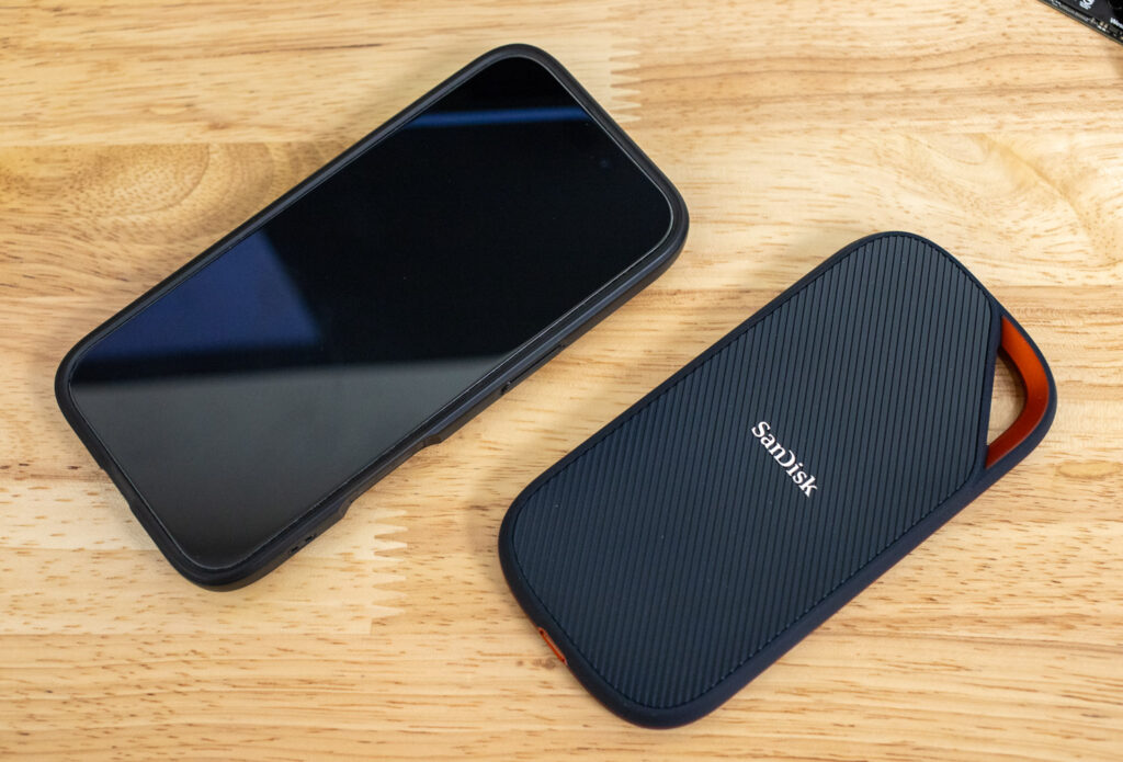 SanDisk Extreme PRO with USB4 size comparison with phone