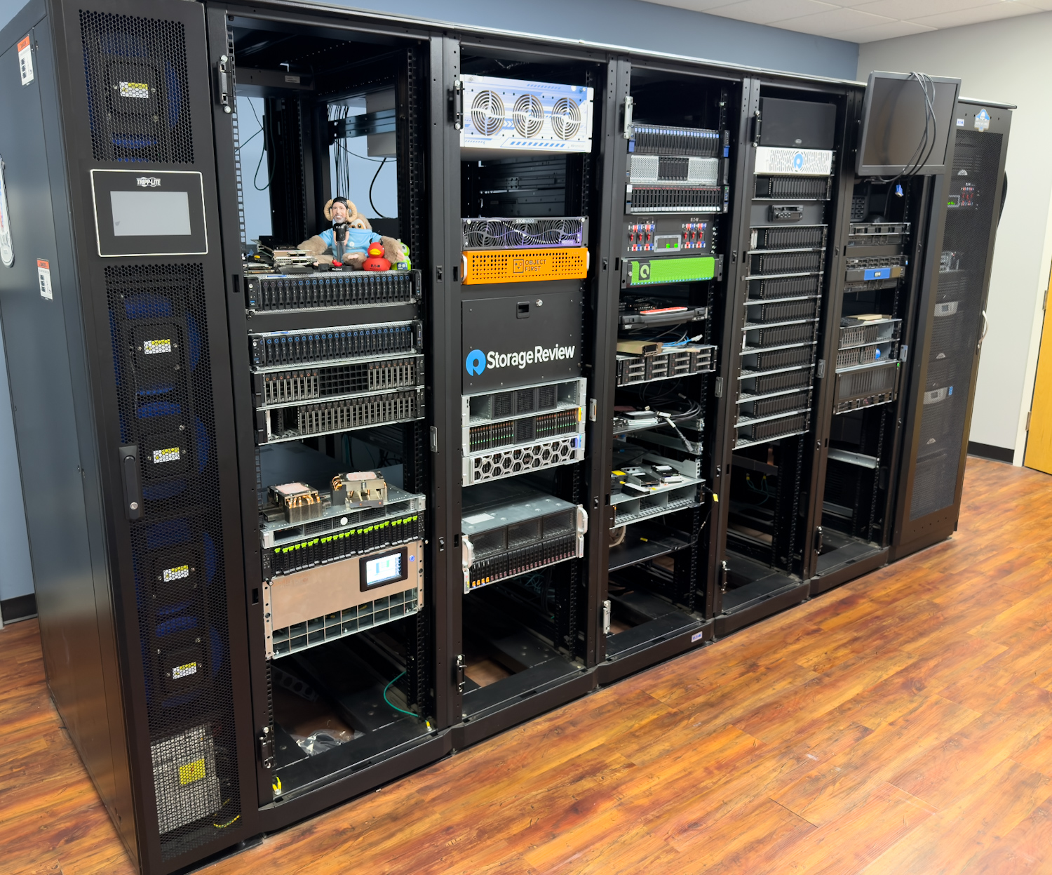 StorageReview lab racks with SRCOOLDXRW25 front view.