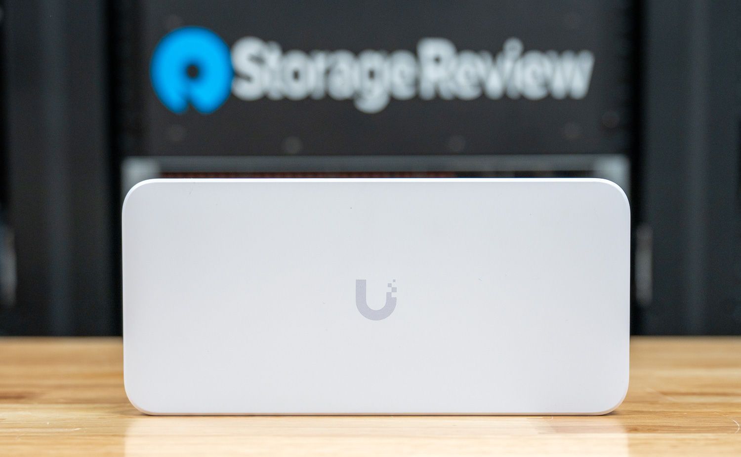 rectangular shaped box the ubiquiti logo on it