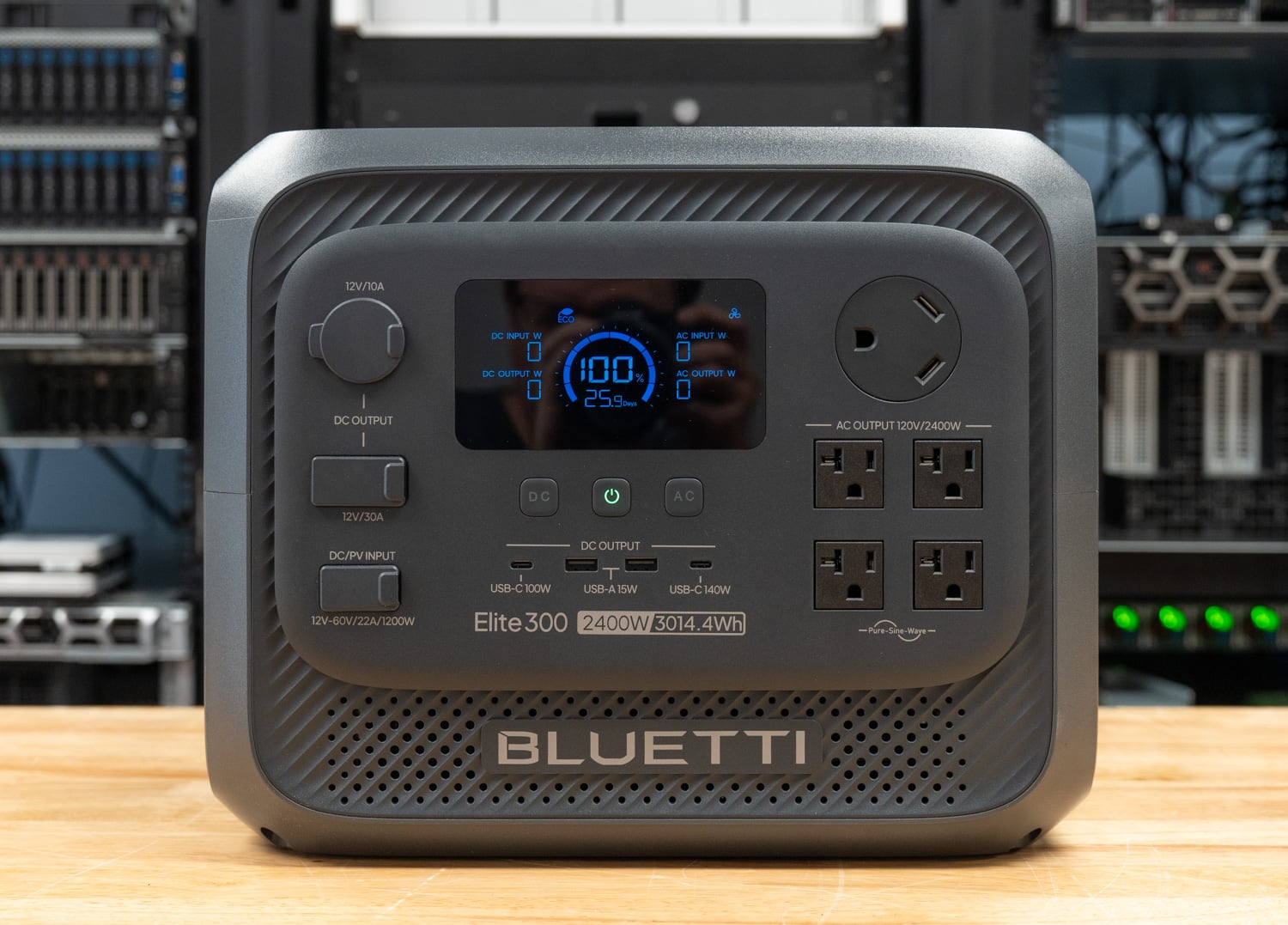BLUETTI Elite 300 portable power station in the StorageReview lab, showing the front display, DC outputs, four AC outlets, and TT-30 RV outlet