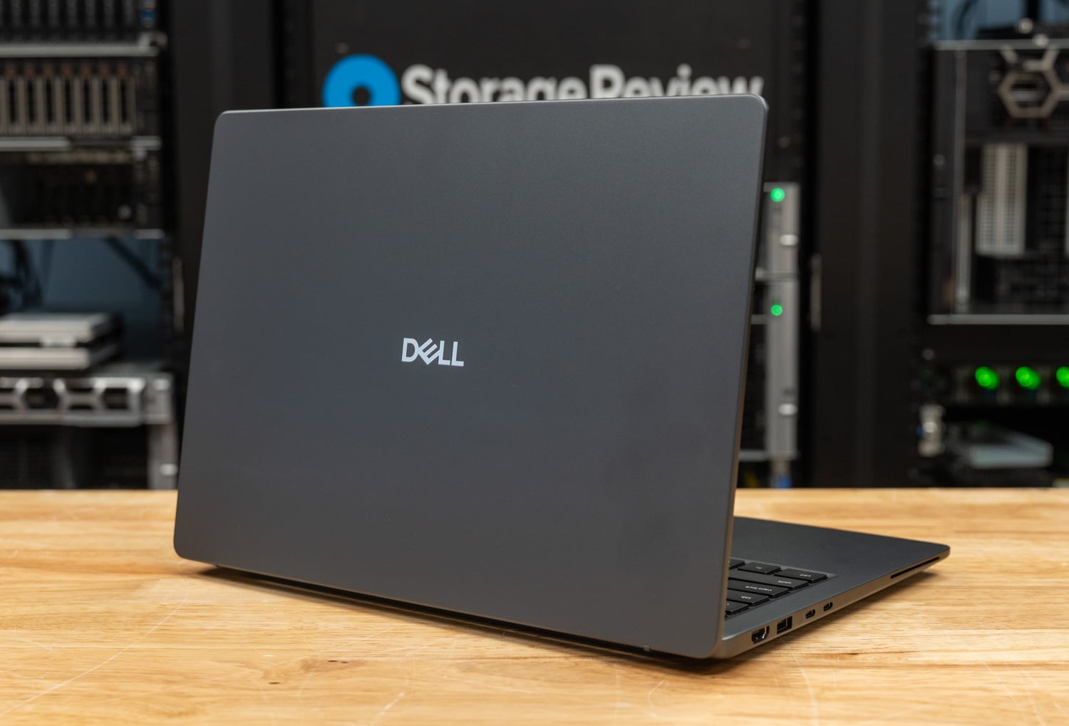 Dell Pro Precision 5 14s AMD rear three-quarter view showing the lid and left side ports
