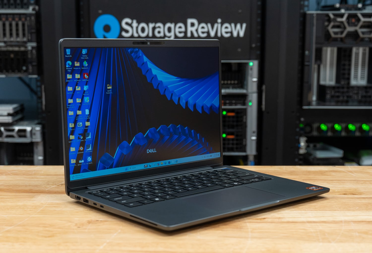 Dell Pro Precision 5 14s AMD open at a three-quarter angle with the QHD+ display on