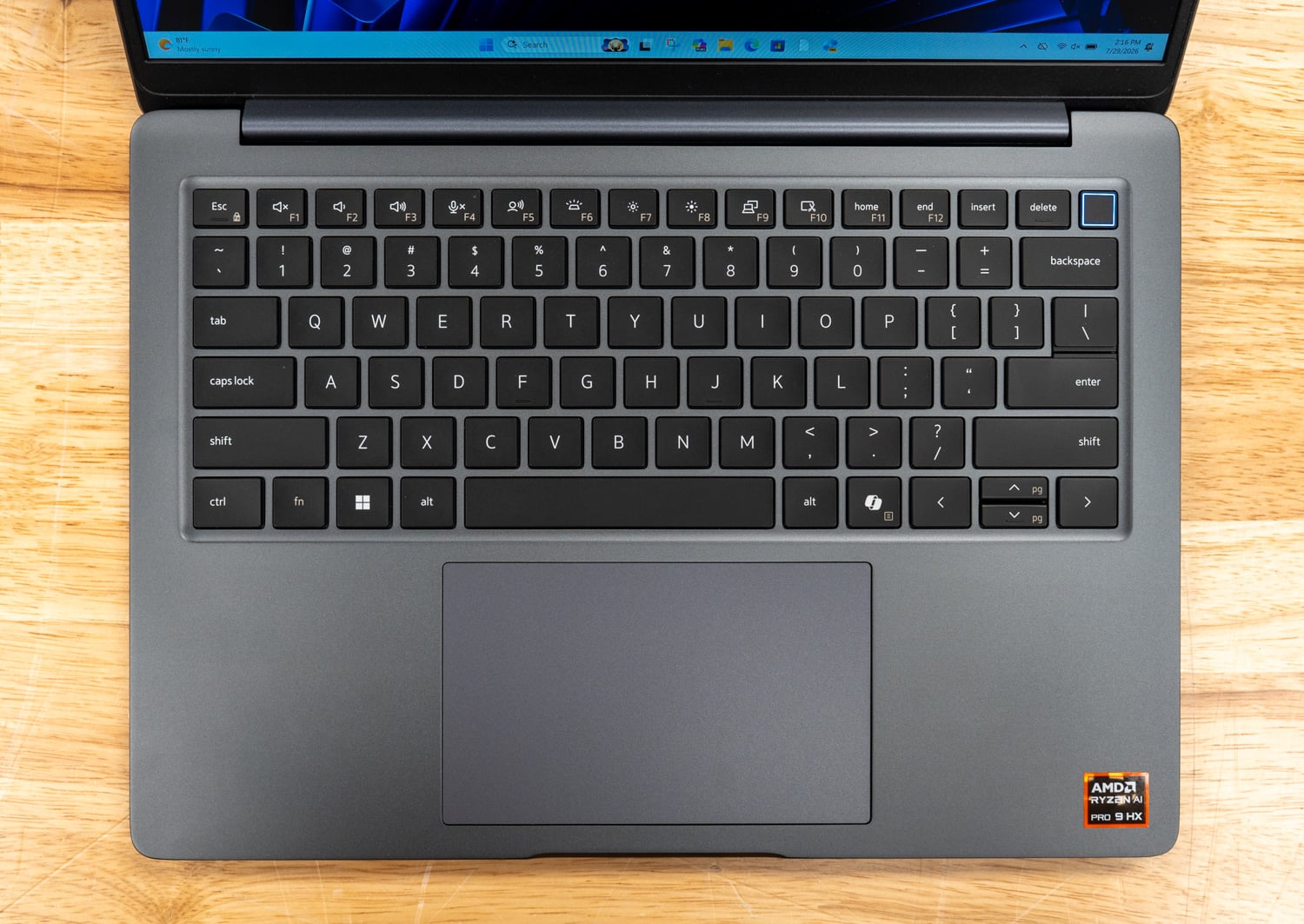 Dell Pro Precision 5 14s AMD keyboard deck with mini-LED backlit keys and fingerprint reader