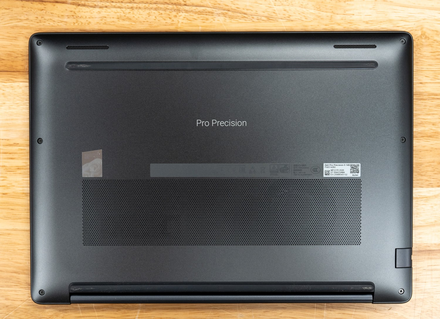 Dell Pro Precision 5 14s underside with ventilation grille and speaker slots