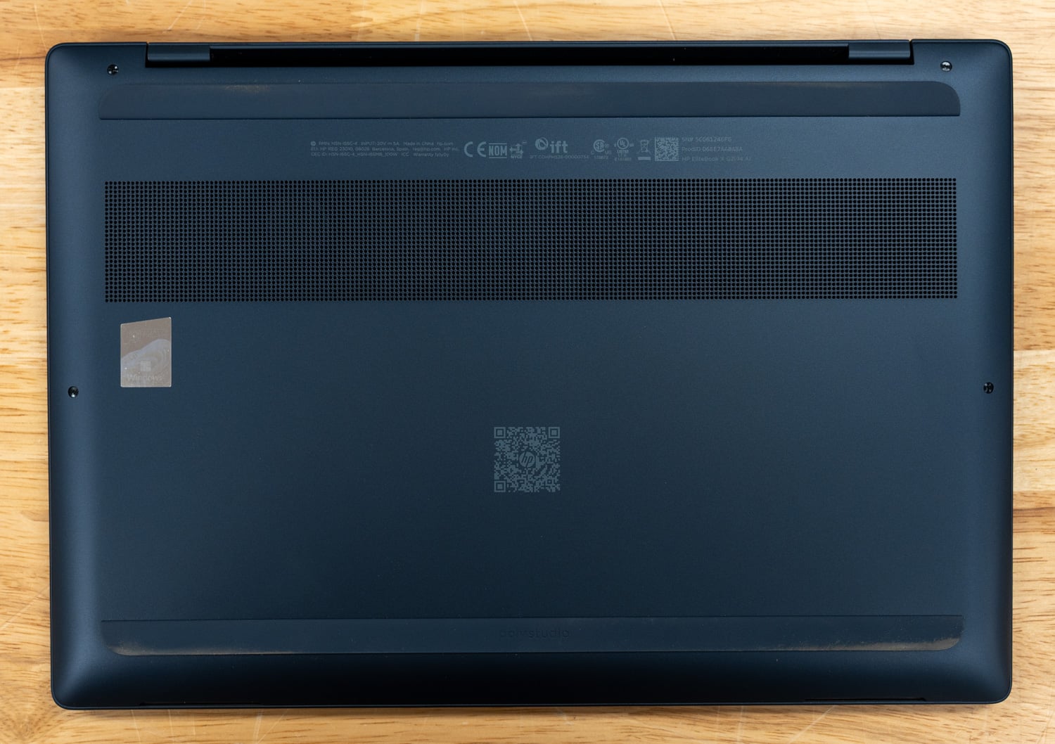 Underside of the HP EliteBook X G2i showing the intake vents