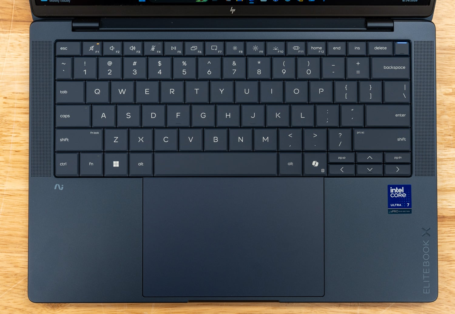 HP EliteBook X G2i keyboard deck with backlit keyboard, glass trackpad, and EliteBook X branding
