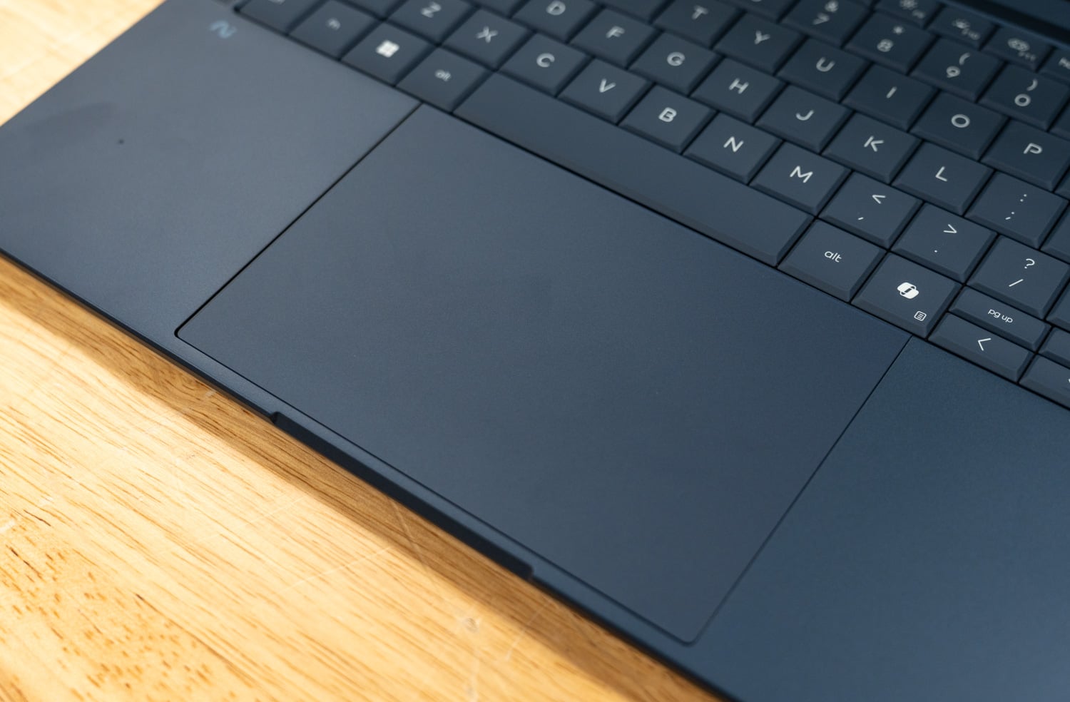 Close-up of the HP EliteBook X G2i trackpad and palm rest