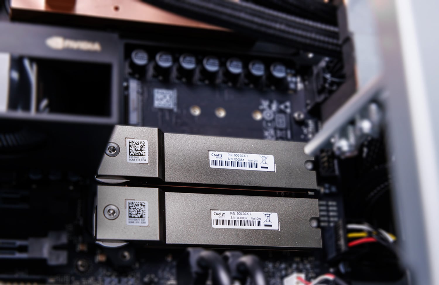 Two 2TB Micron 4600 NVMe SSDs under heatsinks in the MSI XpertStation WS300 M.2 slots