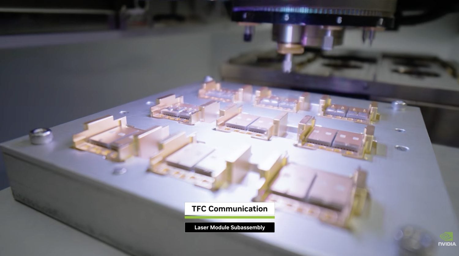 Laser module subassembly at TFC Communication, with copper-colored laser modules held on an assembly fixture