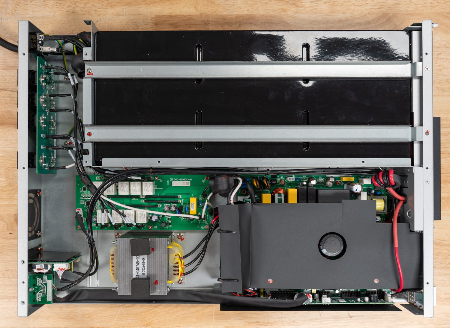 Inside the Ubiquiti UPS 2U Pro: battery pack, per-outlet relay board, transformer, and control boards