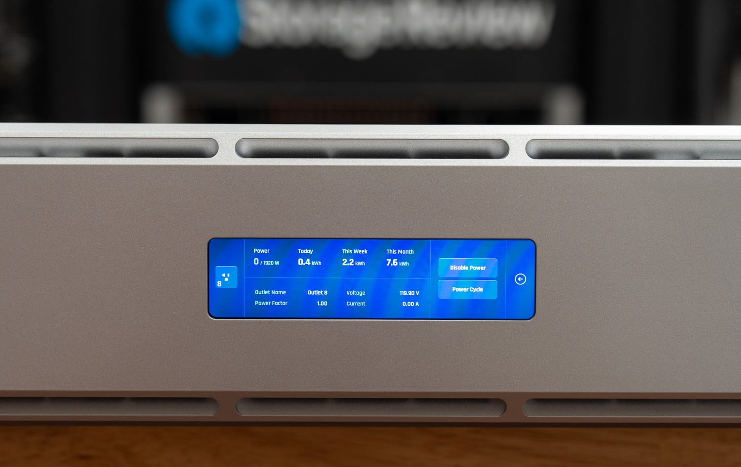 Per-outlet detail on the UPS 2U Pro touchscreen showing power history, voltage, and power cycle controls