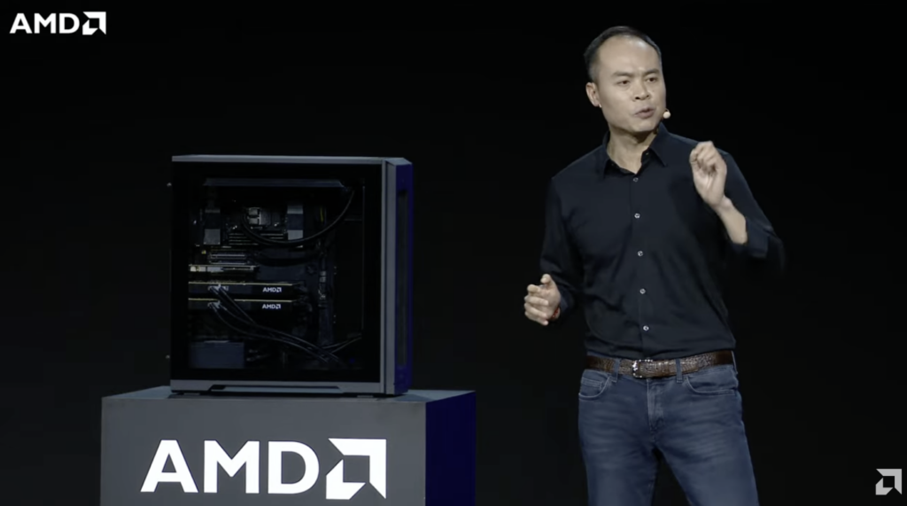 Jack Huynh presents the AMD Threadripper Halo Station on stage at IFA 2026, with the liquid-cooled tower open beside him