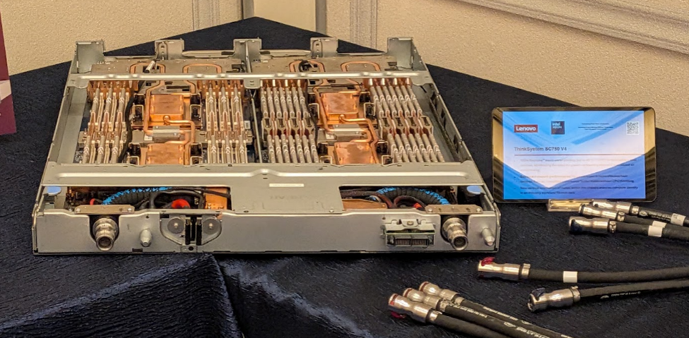 Liquid-cooled Lenovo server tray with copper cold plates and quick-disconnect hoses