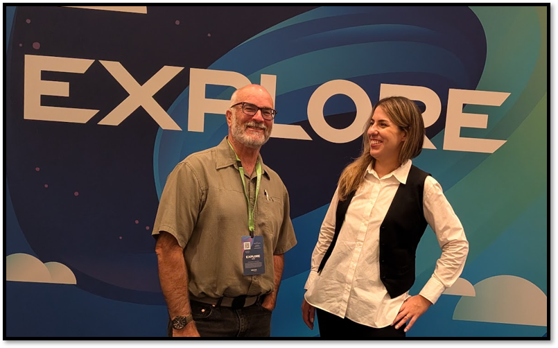 Tom Fenton with Sabina Anja, Chief Technologist for VMware Cloud Foundation, in front of the Explore backdrop