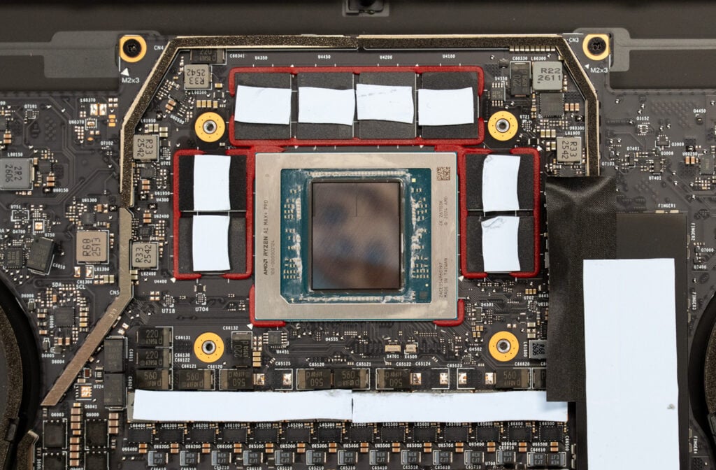 Close-up of the HP ZBook Ultra G3a 16 motherboard showing the AMD Ryzen AI Max+ PRO 495 die surrounded by LPDDR5X memory packages