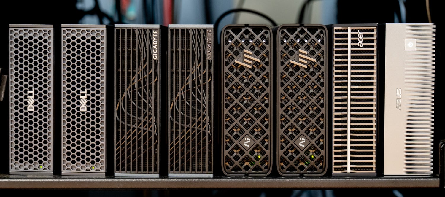 Eight DGX Spark class systems from Dell, GIGABYTE, HP, Acer, and ASUS side by side on a rack shelf in the StorageReview lab, the clients in the DGX Spark shared storage proof-of-configuration run